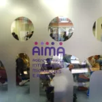 Applicants waiting inside and outside an AIMA immigration office in Portugal
